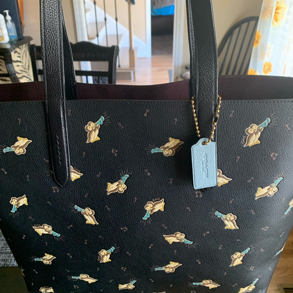 Coach leather penguin trumpet tote bag and small wallet